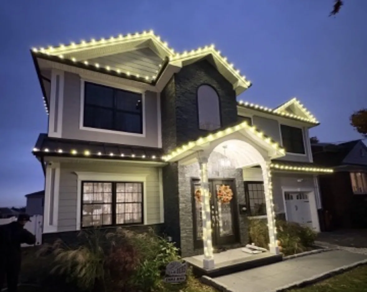 Christmas Lighting in Orange: Wreath + garland on front entry